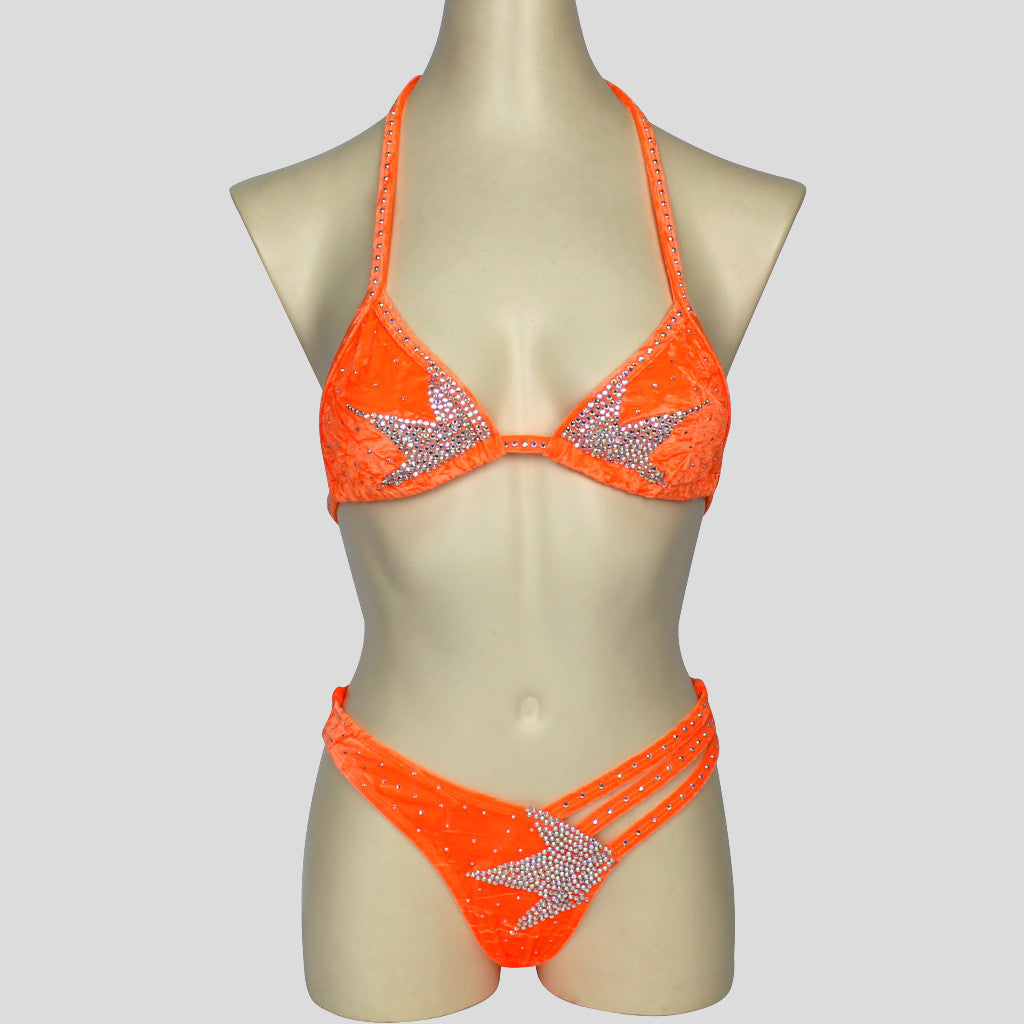 figure bodybuilding bikini in orange with star shaped diamante embellishments and strappy bottoms