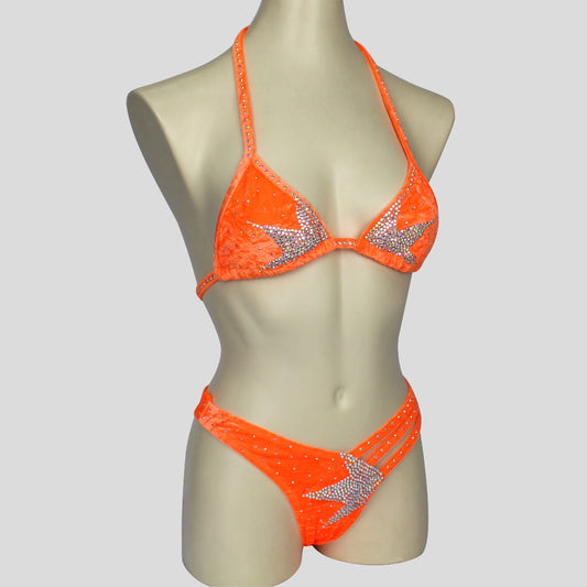 figure bodybuilding bikini in orange with star shaped diamante embellishments and side strappy bottoms