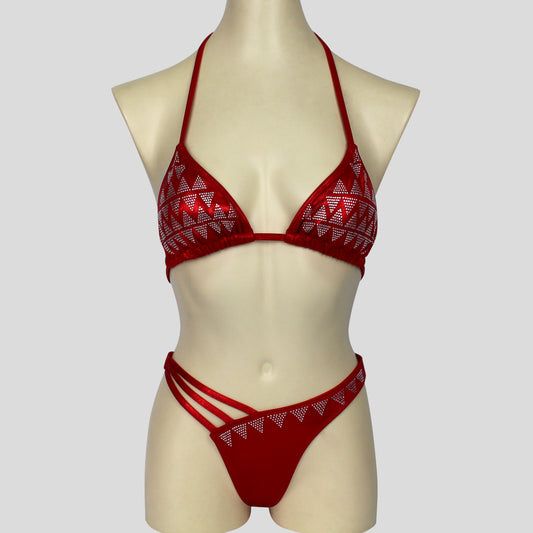 figure bodybuilding bikini set in a deep red with triangle shaped embellishments and strappy bottoms