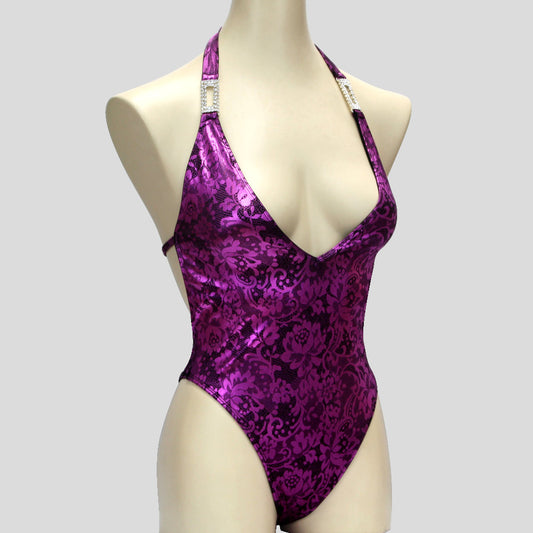 womens' bodybuilding one piece in a purple floral lace print showing the front and side