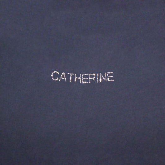 example customised diamante name on plain black fabric