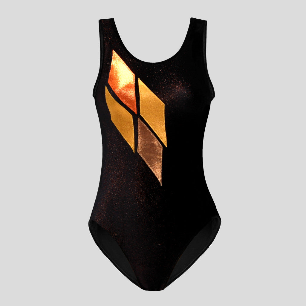 Australian made girls black velvet leotard with copper glitter adorned with an orange diamond geometric design across the chest