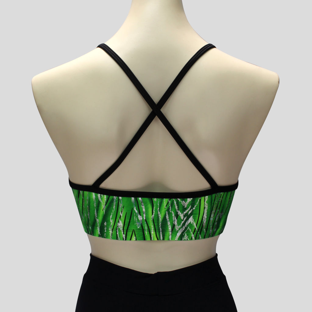 back view of the green glittery grass swirls crop top with black straps