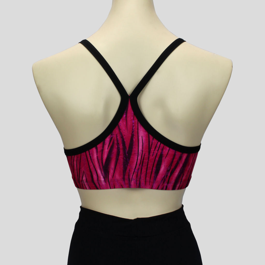 back view of the pink glittery grass swirls crop top with black straps