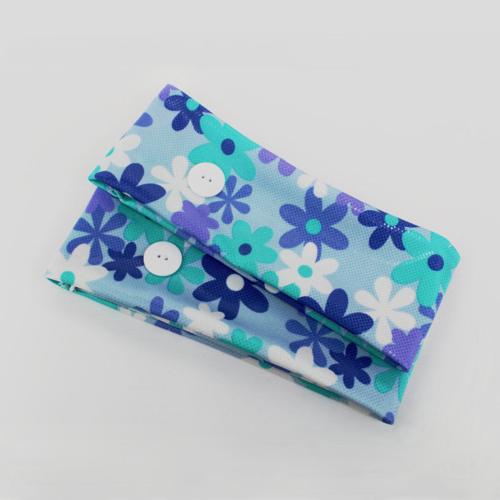 Ear saver button headband in floral print in shades of blue