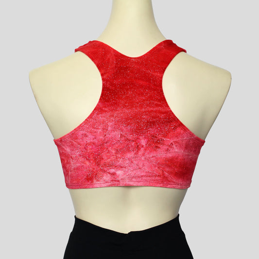 back view of the girls' crushed velvet crop top in a bright red with glitter