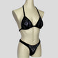 side view of the black velvet bodybuilding competition g-string bikini decorated with silver foil bling