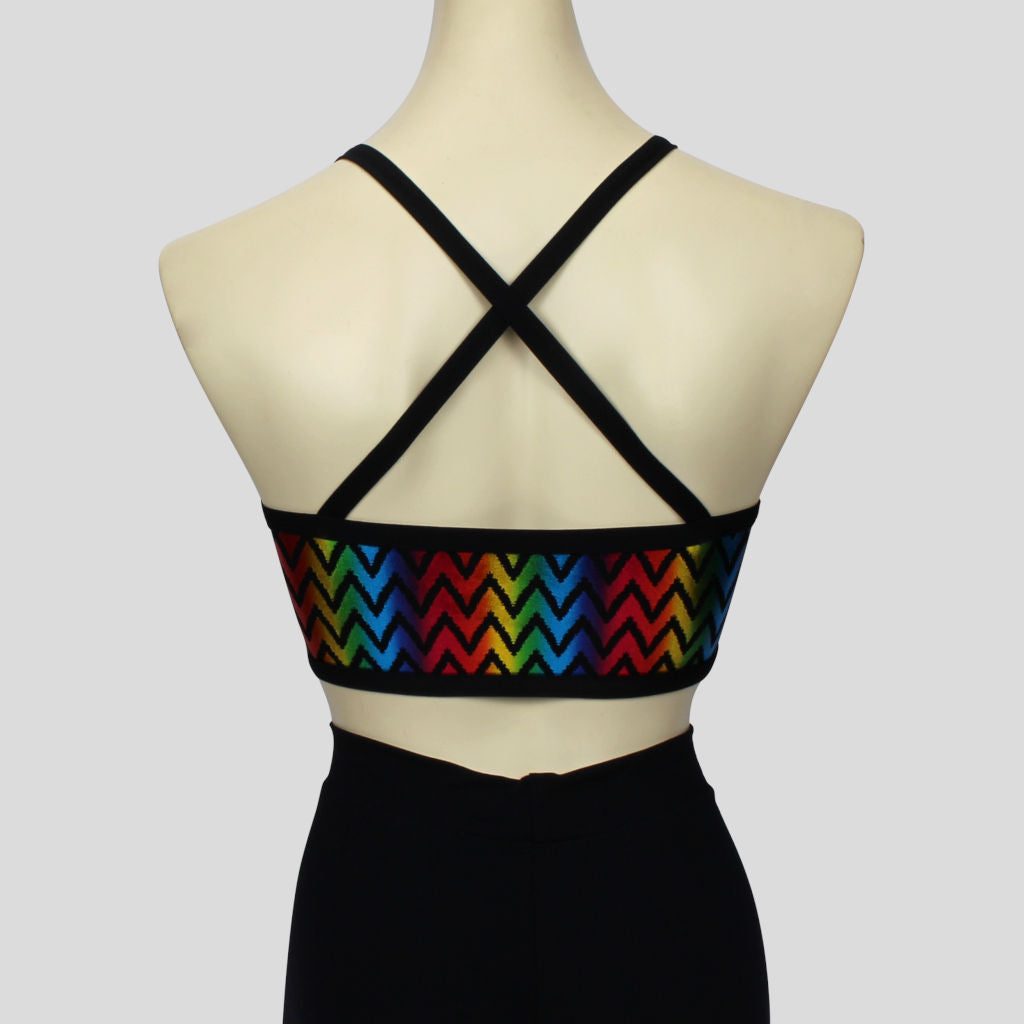 back view of the metallic rainbow zigzag crop top with black straps