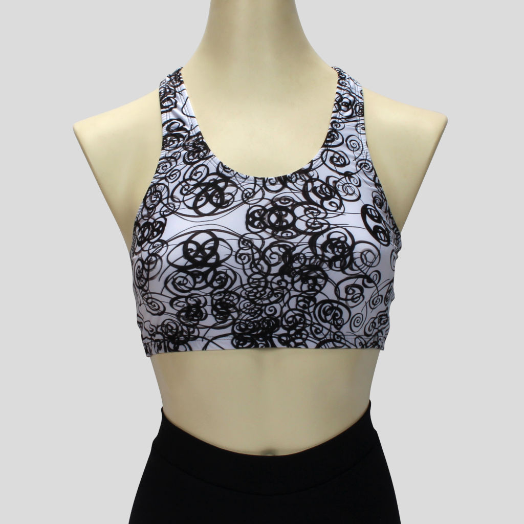 white with black curls pattern crop top in a sportsback style