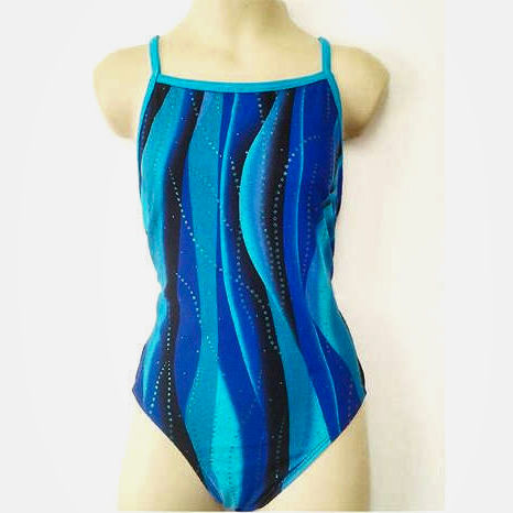 our girls blue swirl swimsuit made of a wavy blue print
