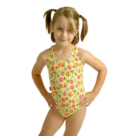girl wearing our kids yellow garden print swimsuit
